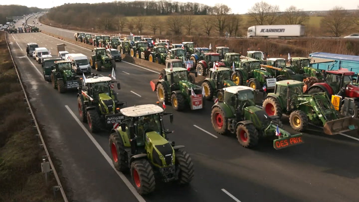 French farmers begin 'siege' of Paris by blocking roads around capital with tractors