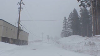 Northern California blizzard brings 10ft of snow and 100mph winds