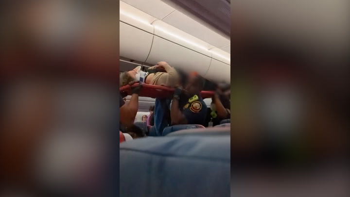 Passengers stretchered off Delta flight after severe turbulence from Milan to Atlanta