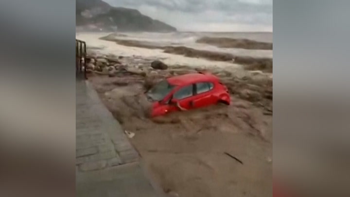 Greece flooding: Car swept into sea by fast flowing rivers