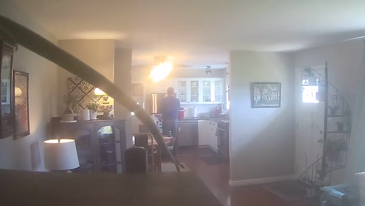 Estate agent filmed on home CCTV drinking client's milk from fridge