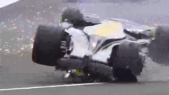 Zhou Guanyu slams into fence after suffering terrifying upside-down crash at British GP
