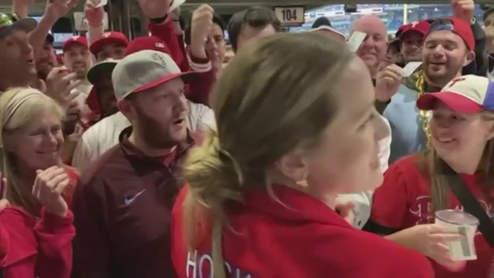 Wife of Phillies baseball star buys rounds of beer for fans at World Series