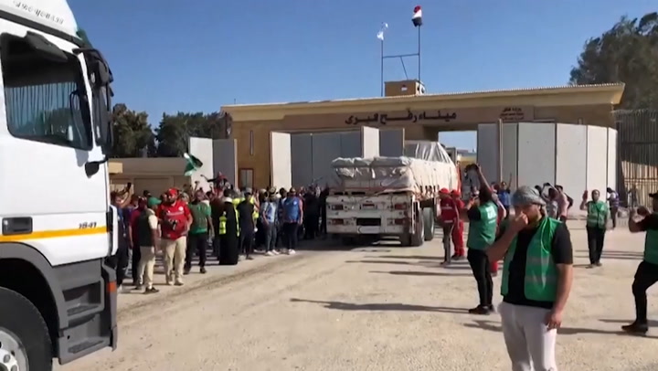 Crowd gathers at Rafah border crossing as humanitarian aid convoy crosses into Gaza Strip