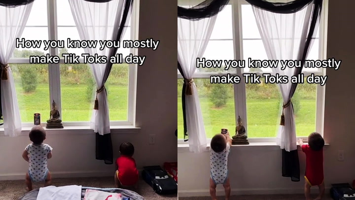 'Adorable twin babies copy mom by acting as if they are making a TikTok 
'