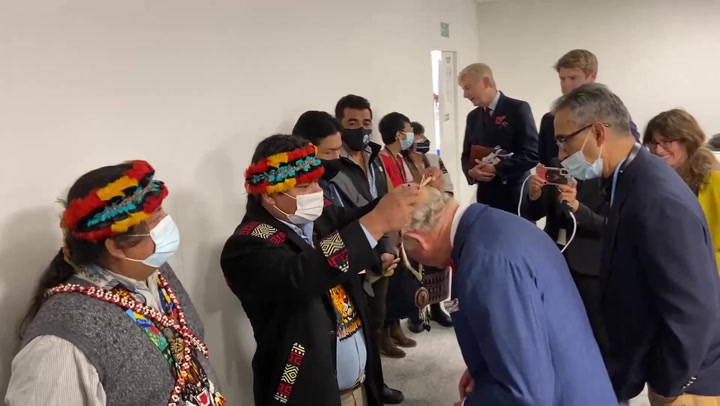 Prince Charles given necklace from indigenous Ecuadorians at Cop26