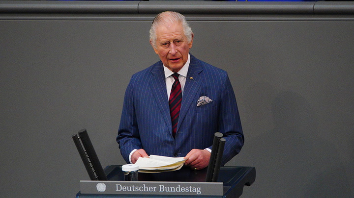 King Charles switches between fluent German and English as he delivers historic address