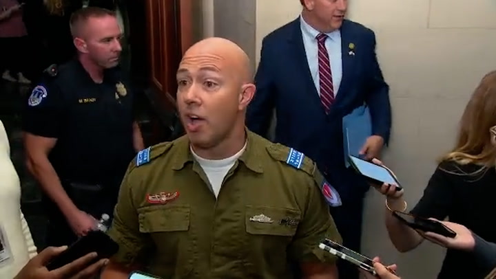 Florida congressman wears an IDF uniform to GOP conference meeting.mp4