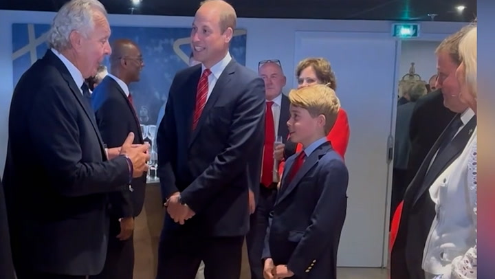 Prince George looks like William's double as they attend Rugby World Cup together