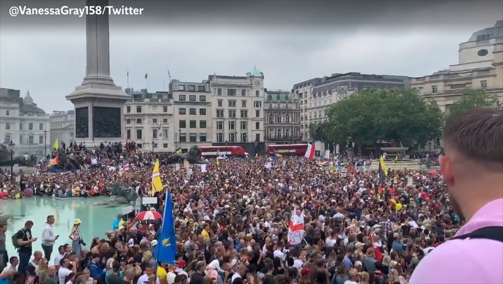 Thousands of anti-vaccine protesters gather in London