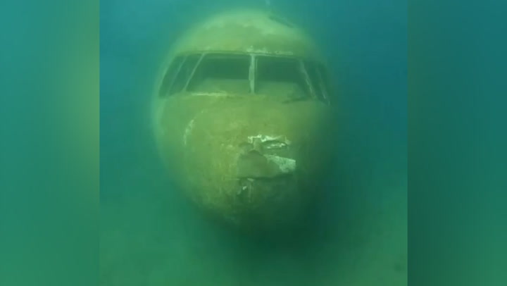 Deep sea footage inside sunken passenger plane mistaken for MH370