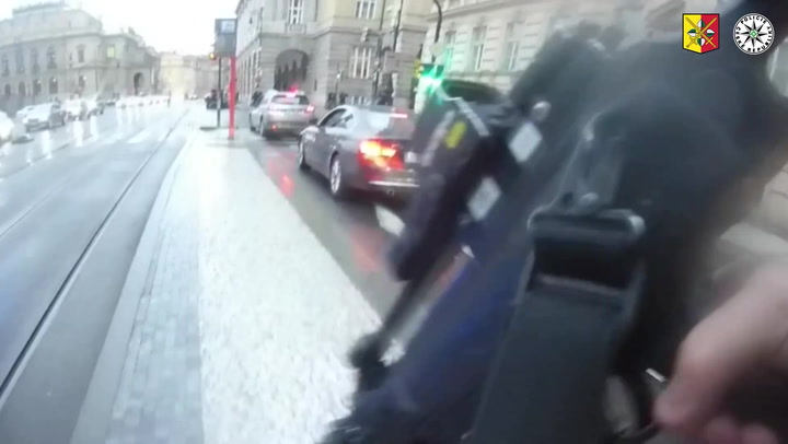 Moment armed police storm Prague university after shooting captured in bodycam footage
