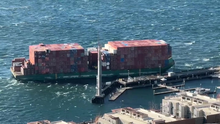 Large 'runaway barge' breaks away from terminal and smashes into Seattle pier
