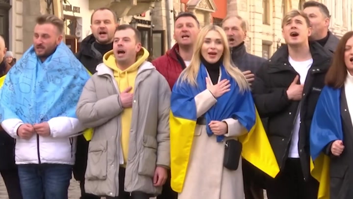 Opera singers perform national anthem in Lviv hours after Russian missiles hit the region