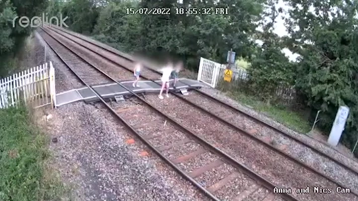 CCTV footage shows children playing on train tracks