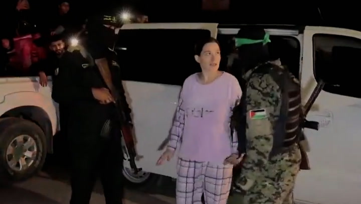 Israeli hostage stares down Hamas terrorist as she is released after 53 days in captivity