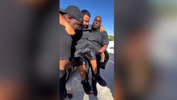 DJ Khaled carried from car to stage to keep Jordans clean