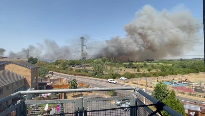 Smoke billows from Dartford wildfire as UK records hottest ever temperature
