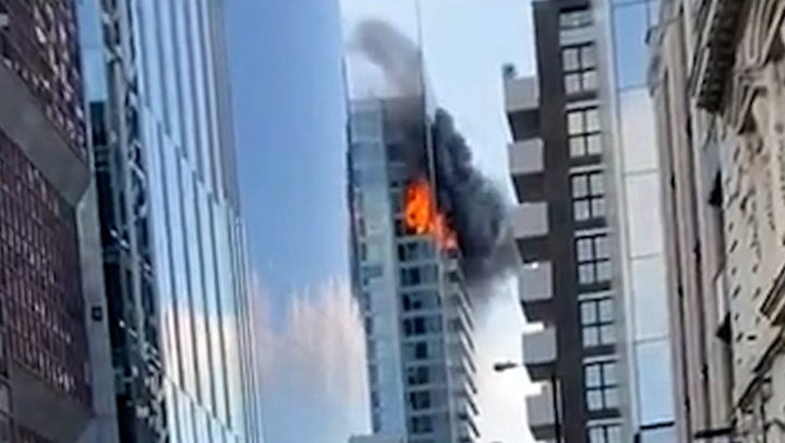 Aldgate fire: Block of flats ablaze in London as glass panels seen plummeting to ground