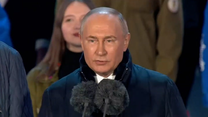 Putin attends concert in Moscow on anniversary of Crimea's annexation
