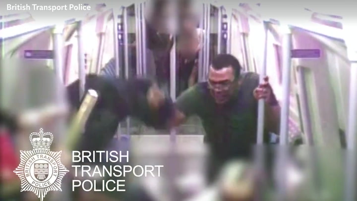 Man attacks tube passengers with machete in terrifying footage