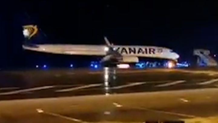 Ryanair flight parked on runway after 'fire onboard' causes emergency landing