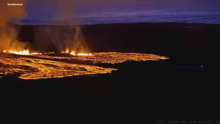 Lava dances around Iceland volcano as it erupts