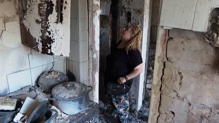 Greek wildfire victim returns to find home in ruins.mp4