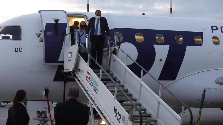 Belarus althlete arrives in Poland after defying orders home