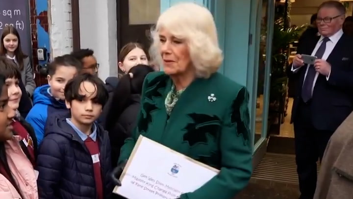 King 'doing very well', Camilla tells well-wishers in Belfast