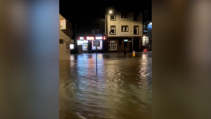 Storm Gerrit: Floodwater rushes down road as rain submerges parts of Scottish town