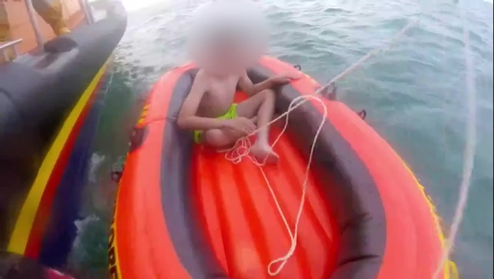 Boy rescued from inflatable dinghy drifting a mile out to sea