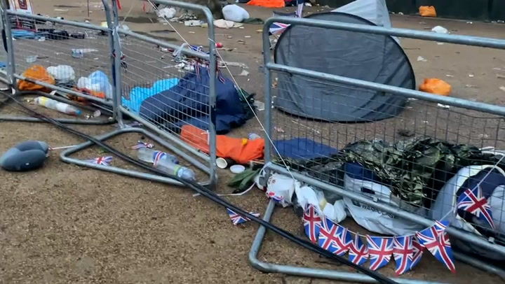 Buckingham Palace Mall littered with tents and union jacks in coronation aftermath