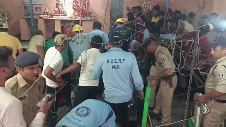 At least 35 killed, 16 injured after well cover collapses inside packed temple in India