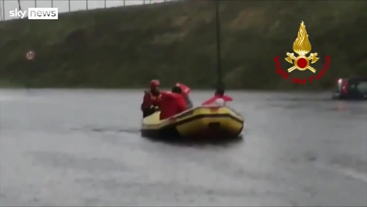 Dozens rescued by rubber rafts as flash flooding leaves cars stranded ...