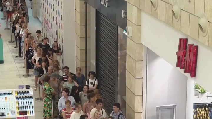 Long queues form outside H&M in Moscow as clothing retailer shuts Russian stores