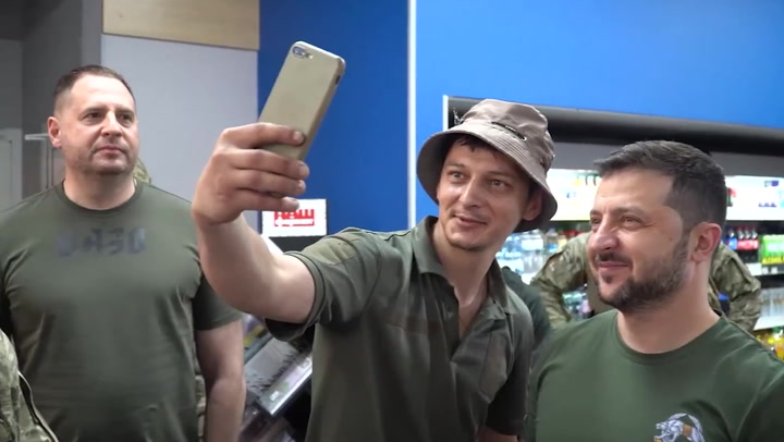 Volodymyr Zelensky takes selfies with soldiers during Bakhmut visit