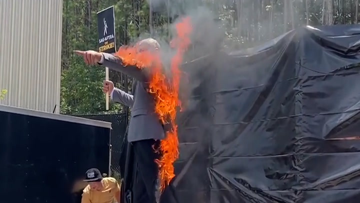 Moment Hollywood stunt performer lights himself on fire in support of SAG strike