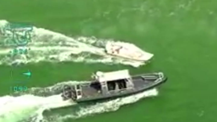 Police chase out-of-control boat circling close to Florida beach