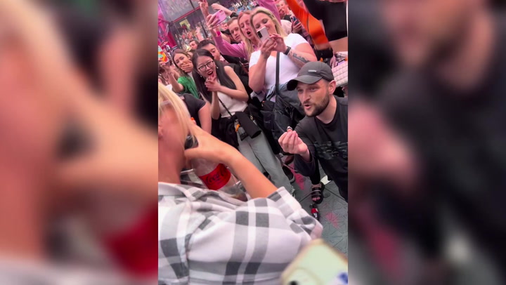 Moment couple gets engaged at Ed Sheeran concert