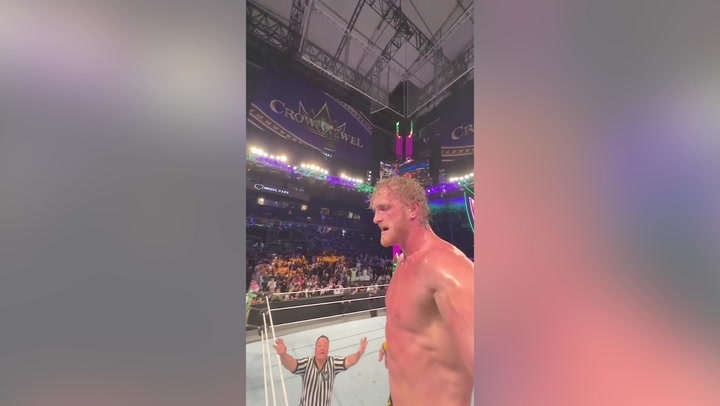 Logan Paul films POV footage as he jumps off top rope in WWE match vs Roman Reigns