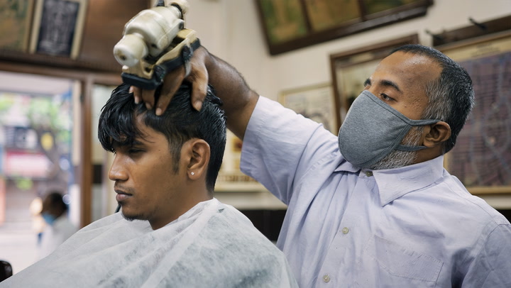Take a look inside the oldest barbers in Chennai for an authentic Indian head massage & haircut
