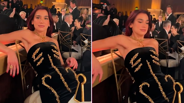 Dua Lipa shows how hard it was to sit down in Golden Globes dress