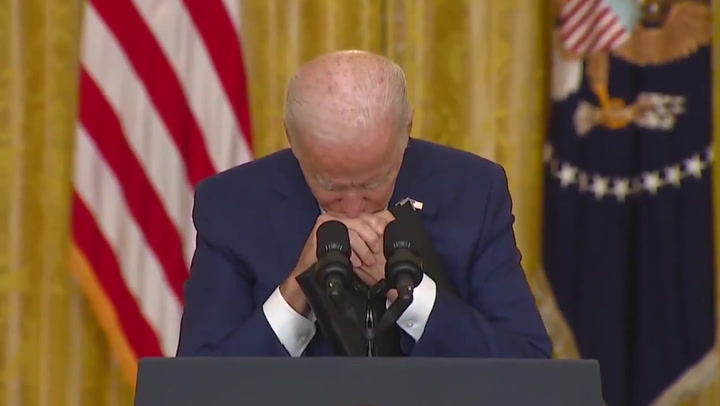 Biden rests head on his hands during tense exchange with Fox reporter after Kabul statement