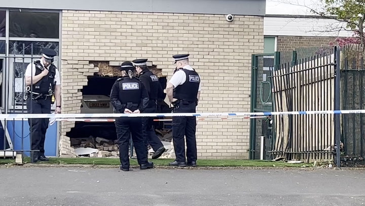 Emergency services at scene after car crashes into primary school in Liverpool