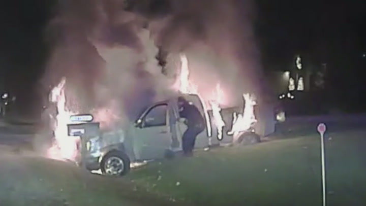 Dramatic rescue of driver from burning truck by Fraser police caught on video