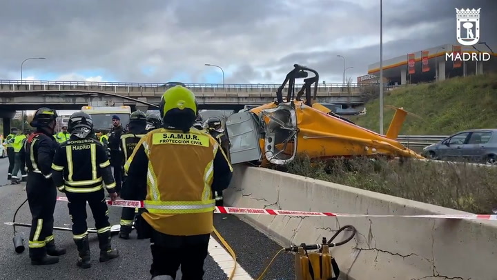 Emergency services investigate after helicopter crashes onto busy Madrid motorway