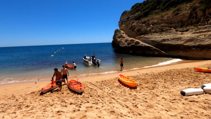 Boat and Kayaks on the Beach Video 