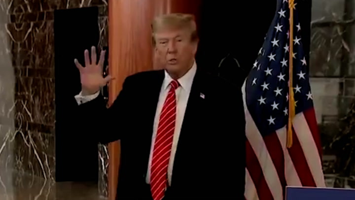 Donald Trump makes AI joke when quizzed about red dots on his hands