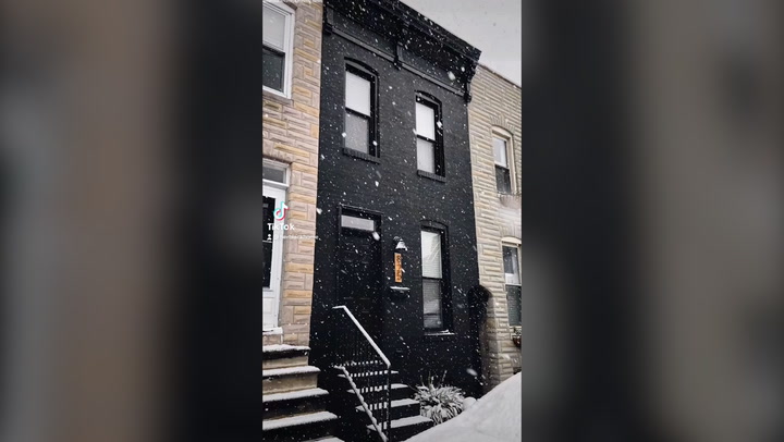 Neighbours dub photographer’s home ‘Devil’s house’ after she paints it black